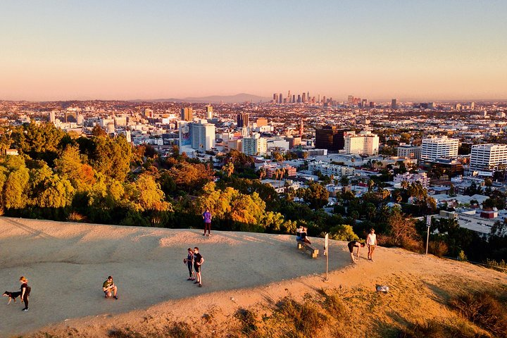 Experience stunning skyline views of Los Angeles while walking through serene Hollywood Hills paths guided by Scott and his friendly dog Blue. Ideal for all adventurers.